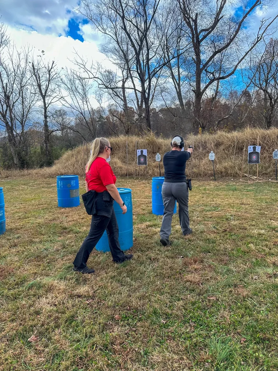 Student practicing pistol handling technique during Basic Pistol Course instruction