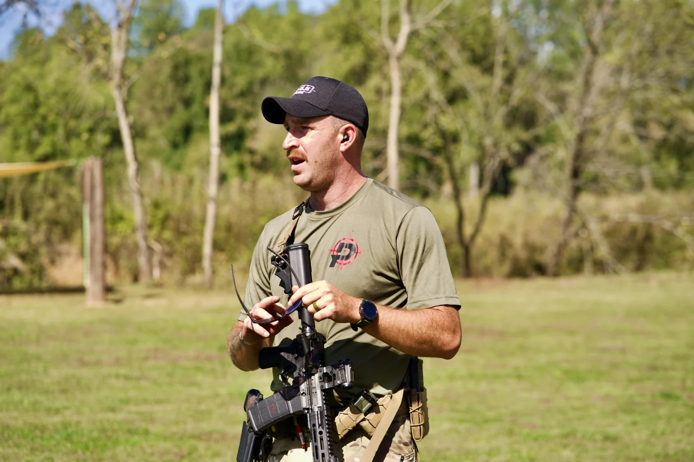 Zack Lathem, co-instructor and tactical specialist at Precision Dynamic Training, coaching on the range